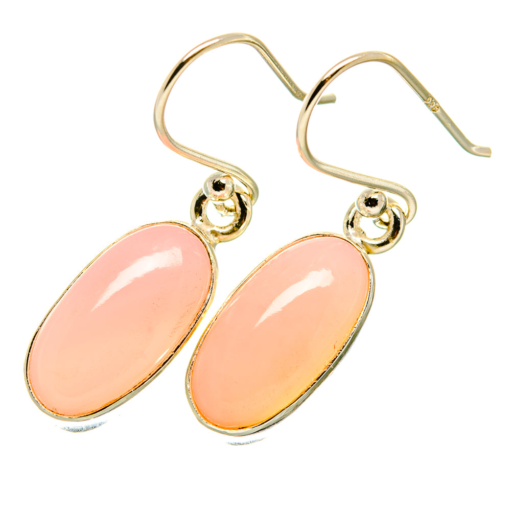 Pink opal drop earrings with oval pink stones and gold-tone hooks