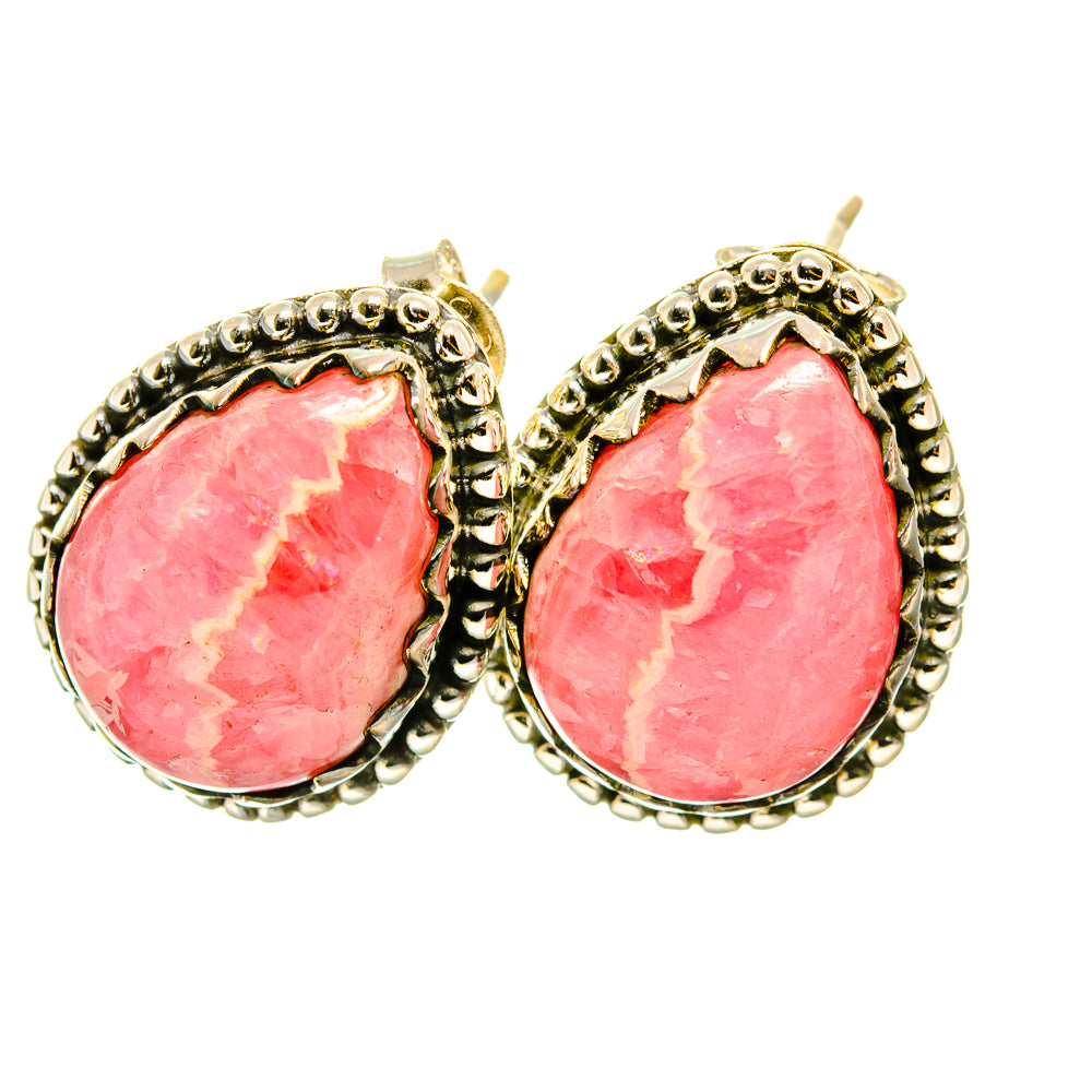 Pink rhodochrosite teardrop earrings with ornate 925 sterling silver settings and hooks.