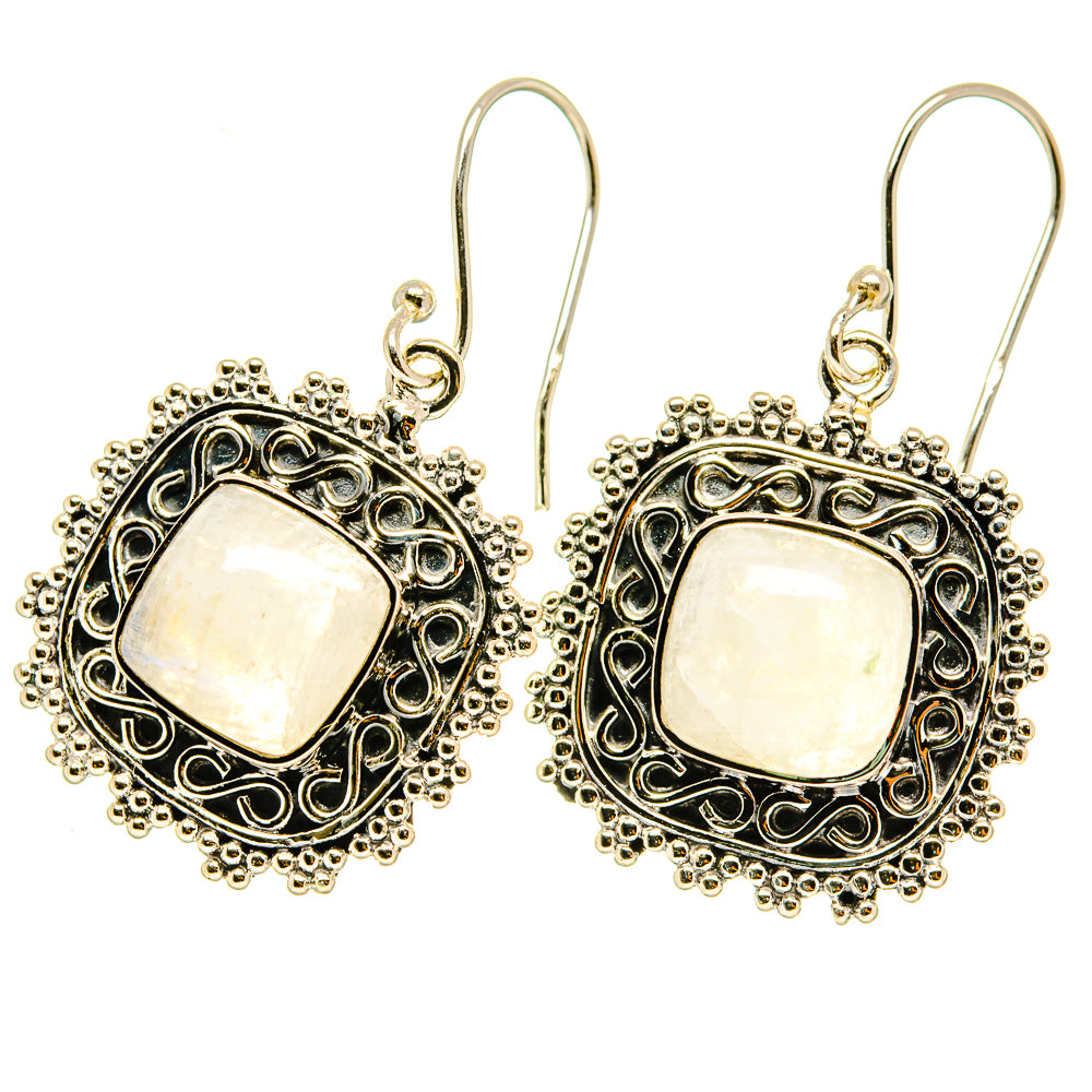 Rainbow moonstone drop earrings with cushion-shaped stones and ornate sterling-silver filigree