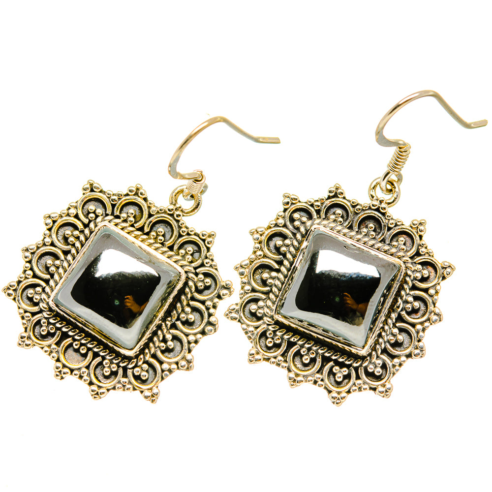 Hematite square dangle earrings with black center, ornate gold-tone frame and fishhook backs