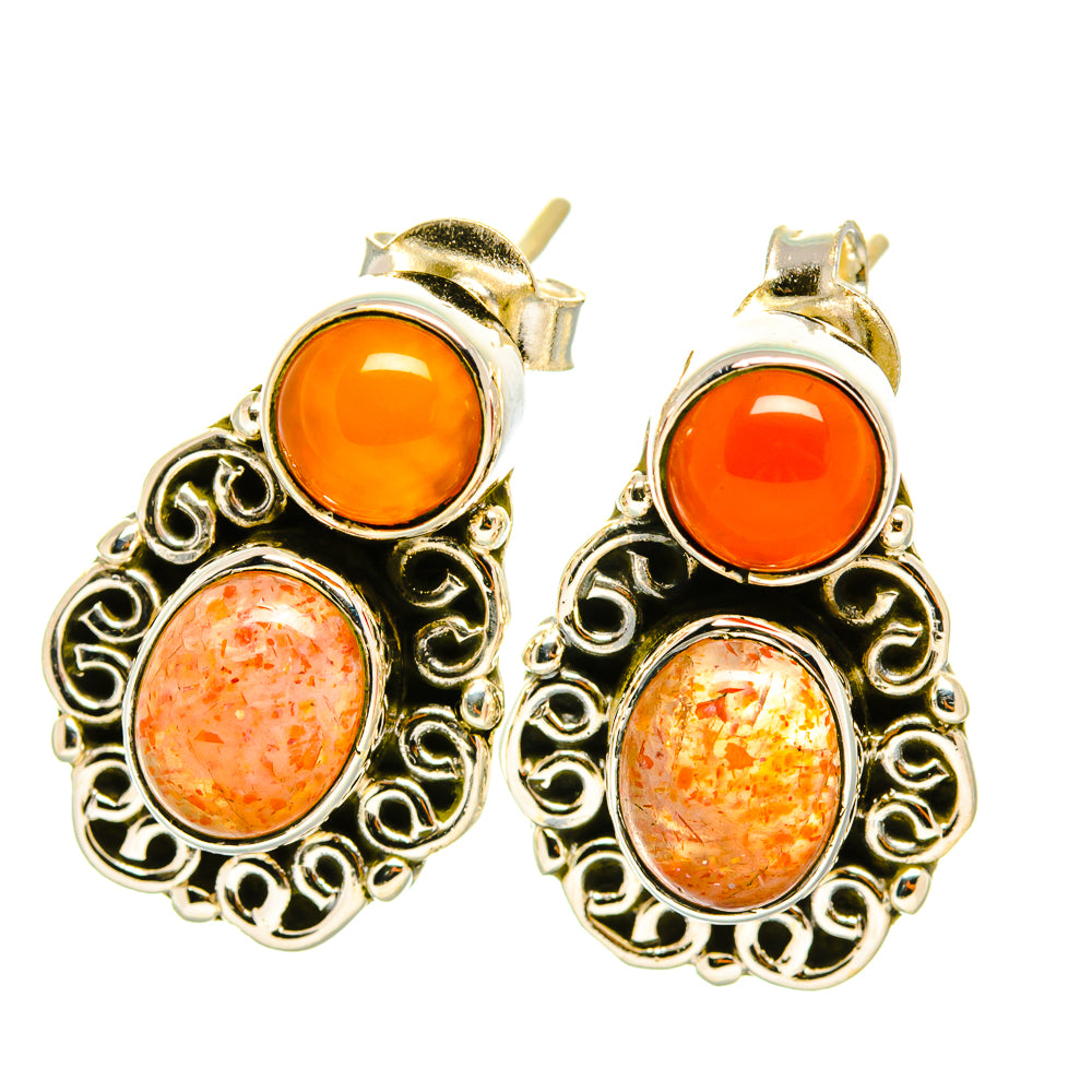 Carnelian and sterling silver stud earrings with orange and speckled round stones