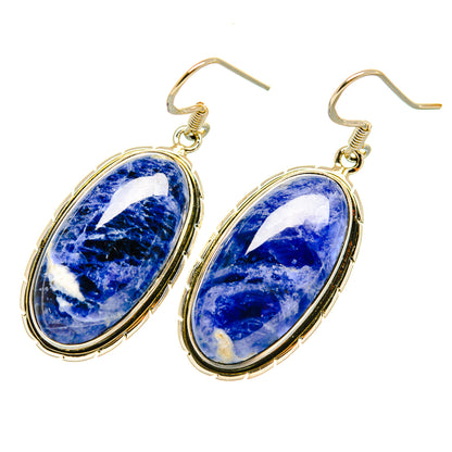 Oval blue sodalite earrings with gold-tone bezel and French hook closures