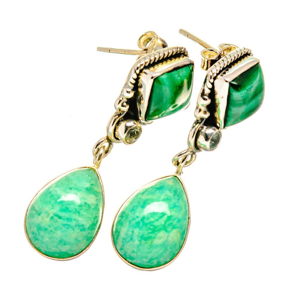 Green gemstone drop earrings with dangling oval stones and gold-tone chain links