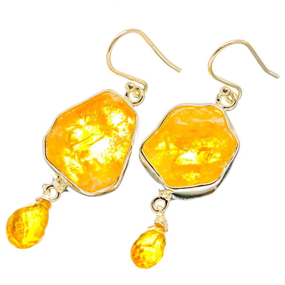 Rough citrine earrings with square silver settings and dangling orange teardrop stones