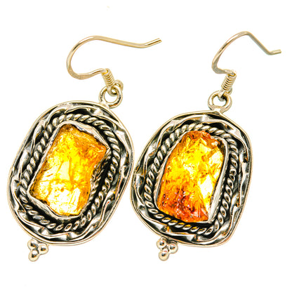 Rough citrine earrings in silver oval rope bezel with hook backs, small dangles