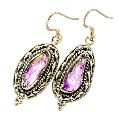 Sterling silver rough amethyst teardrop earrings, purple stone in braided oval border, hooks