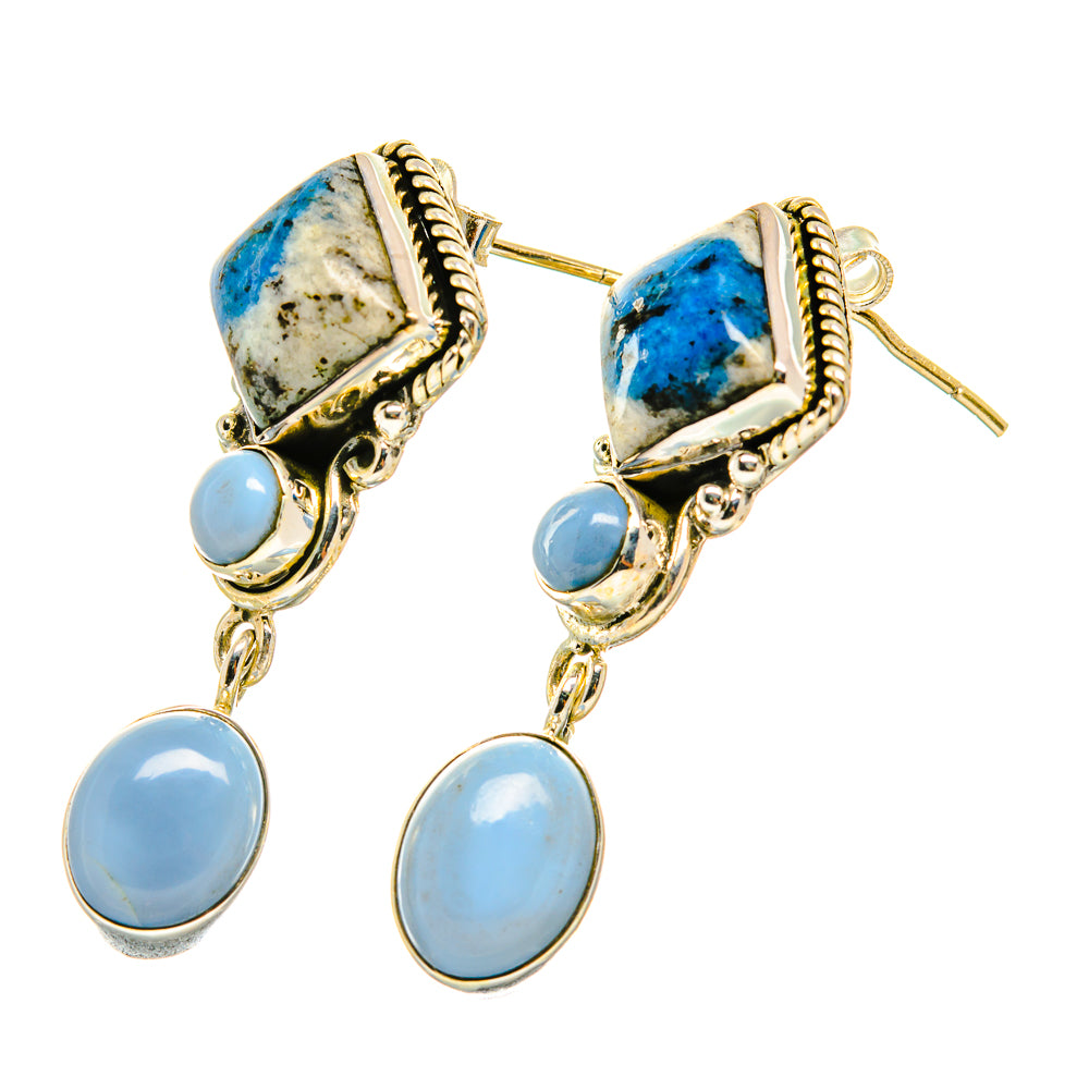 Blue stone drop earrings with gold-tone settings, square tops and oval dangling opals