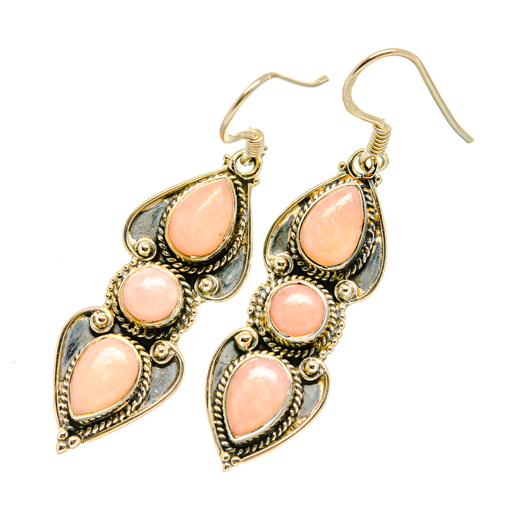 Pink opal drop earrings with ornate silver settings and five teardrop stones, fishhook