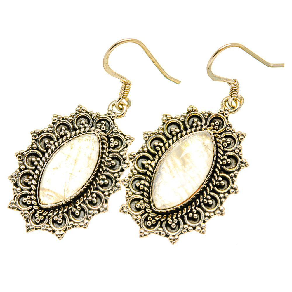 Iridescent oval gemstone earrings with detailed filigree frames and metal fishhook backs