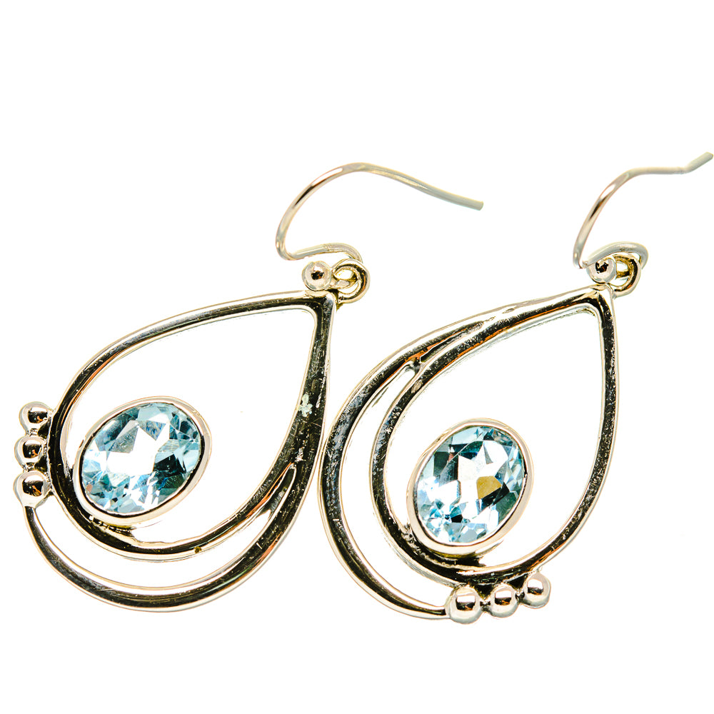 925 sterling silver teardrop earrings with blue topaz, prong-set stones and hooks
