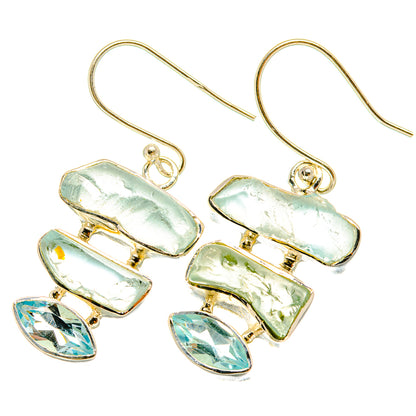 Rough aquamarine-style drop earrings with blue oval stones and hook backs