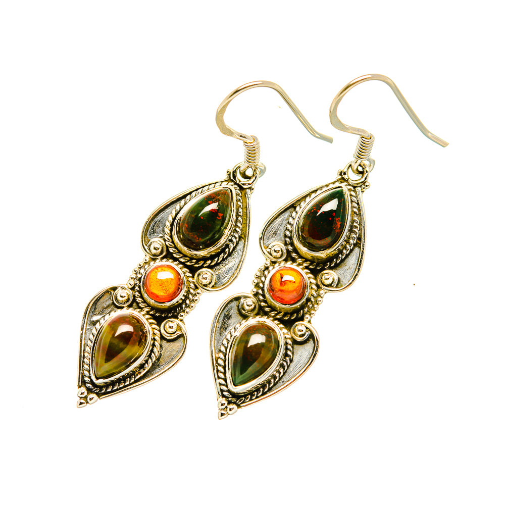 Gold-tone drop earrings with green and red teardrop stones, ornate filigree