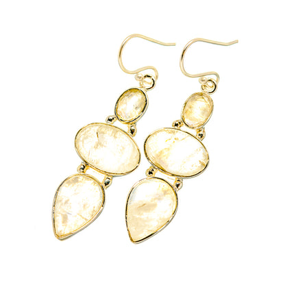 Gold-tone moonstone drop earrings with four oval and teardrop rainbow stones