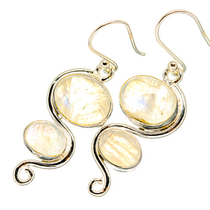 Sterling silver moonstone drop earrings with oval opalescent stones and swirl settings