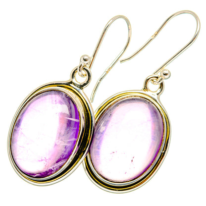 Amethyst oval drop earrings with purple stones and gold-tone bezel on silver hooks