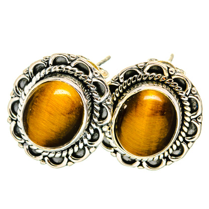 Tiger eye stud earrings with round golden-brown cabochons in ornate sterling silver settings