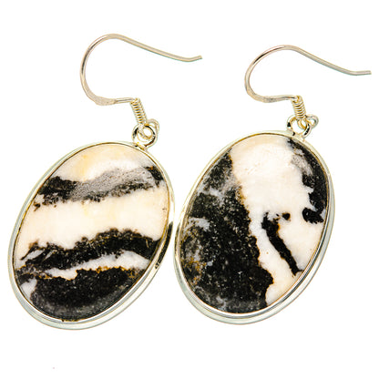 Oval pinolith jasper earrings with black-and-white marbled stone and gold-toned hooks