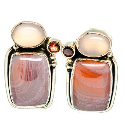 Sterling silver gemstone earrings with pink oval and rectangular stones, red accents