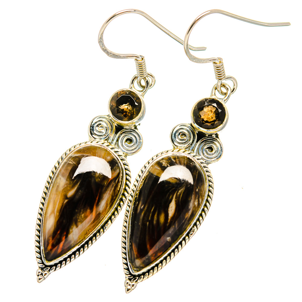 Gold and dark teardrop gemstone dangle earrings with silver filigree and hooks