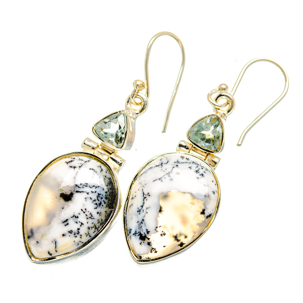Sterling silver drop earrings with white dendritic opal pear stones and blue topaz accents