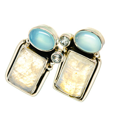 Sterling silver drop earrings with rectangular opal-like stones and aqua cabochon tops