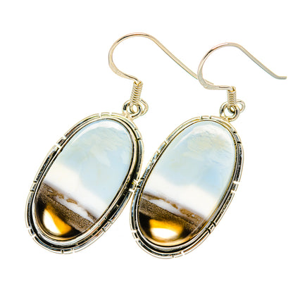 Oval white opal cabochon drop earrings, silver-tone oval frames with teardrop silhouette