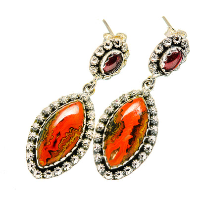 Sterling silver drop earrings with orange-red oval agate and small red bezel stones