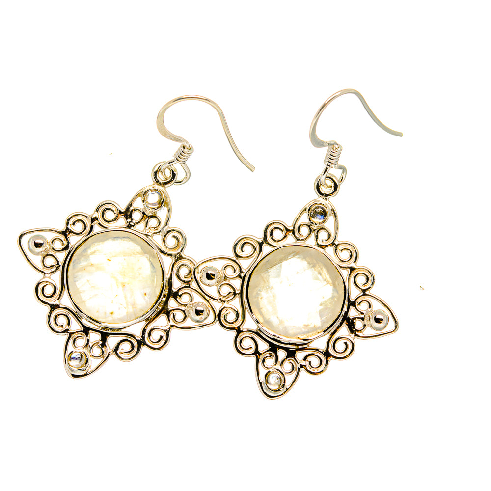 Round moonstone drop earrings with ornate filigree and hook backs