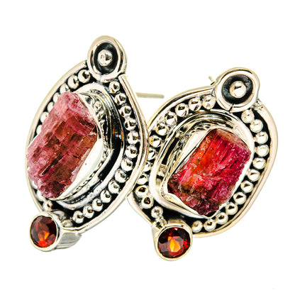 925 sterling silver earrings with rough pink stones, ornate bezels, and red garnet accents