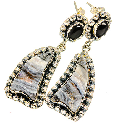 Black onyx and druzy drop earrings with ornate silver-tone bezels and dangling gray stones