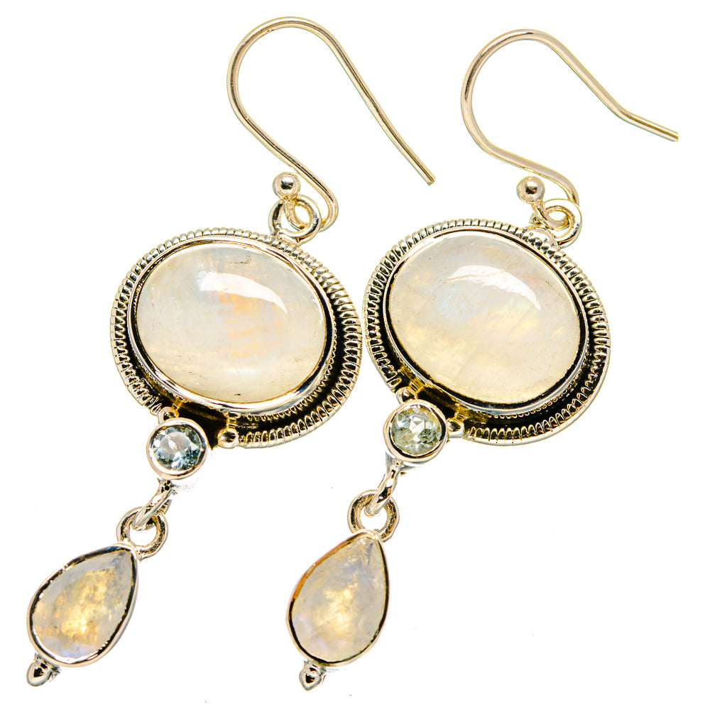 Sterling silver drop earrings with opalescent round stones and blue topaz accents