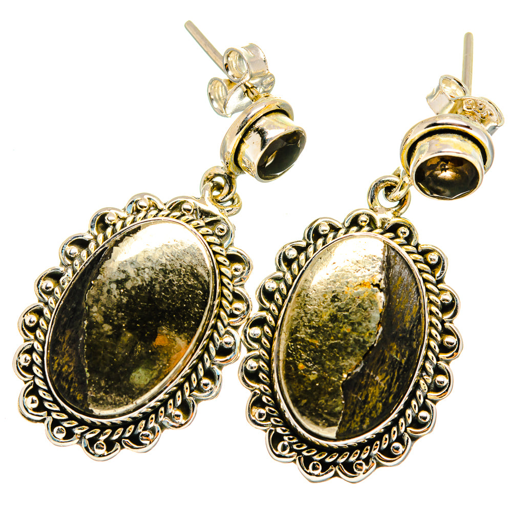 Pyrite agate drop earrings with two oval dark stones and ornate gold-tone frames