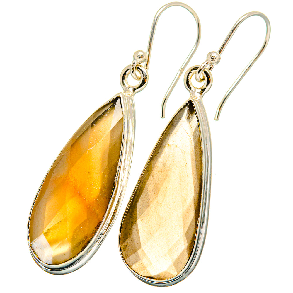 Silver teardrop earrings with faceted yellow-gold gemstone drops