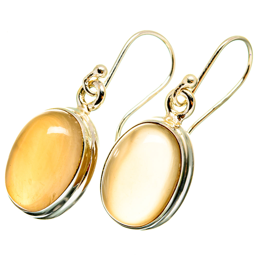 Oval moonstone drop earrings with sterling-silver bezels and curved hooks, golden orange