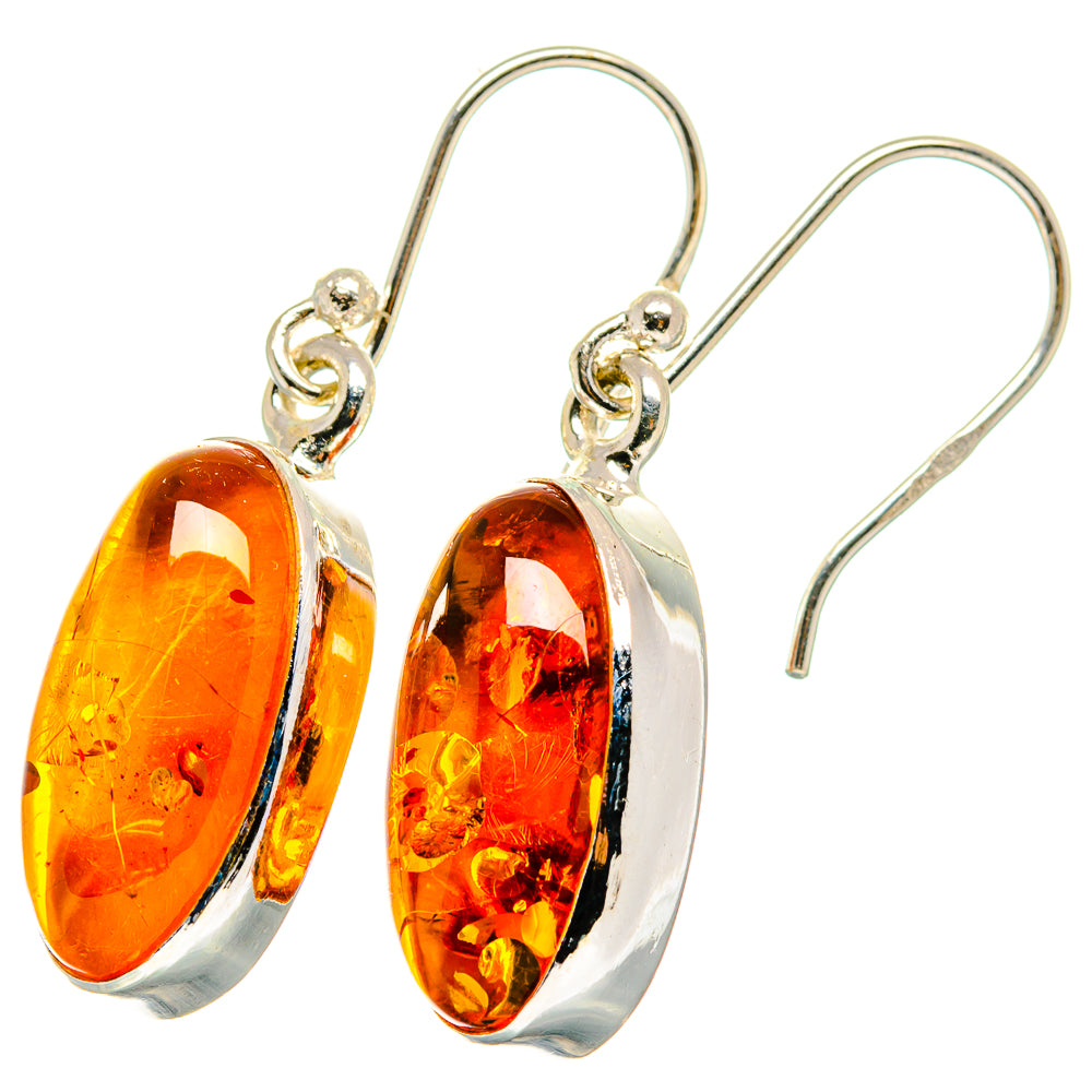 Amber teardrop earrings in 925 sterling silver with looped drop settings