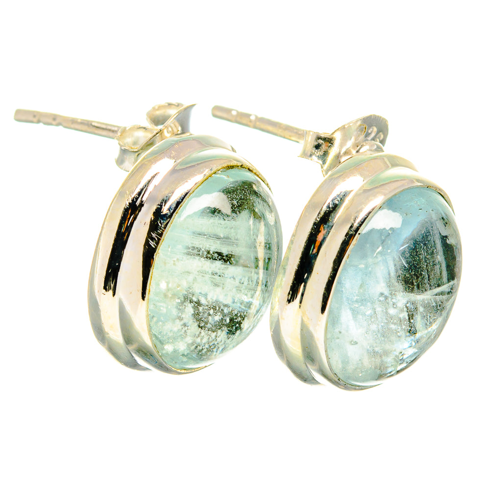 Bezel-set oval aquamarine stud earrings in 925 sterling silver, polished silver frame
