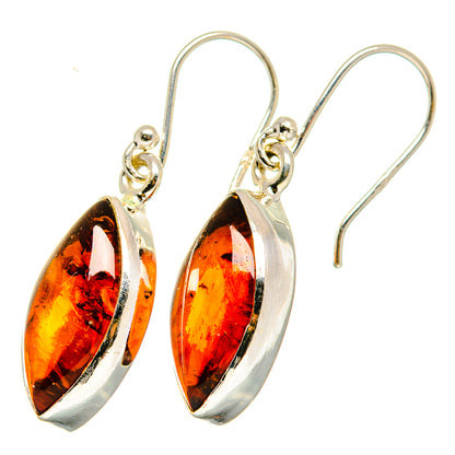 Amber and sterling silver teardrop drop earrings with curved hook backs