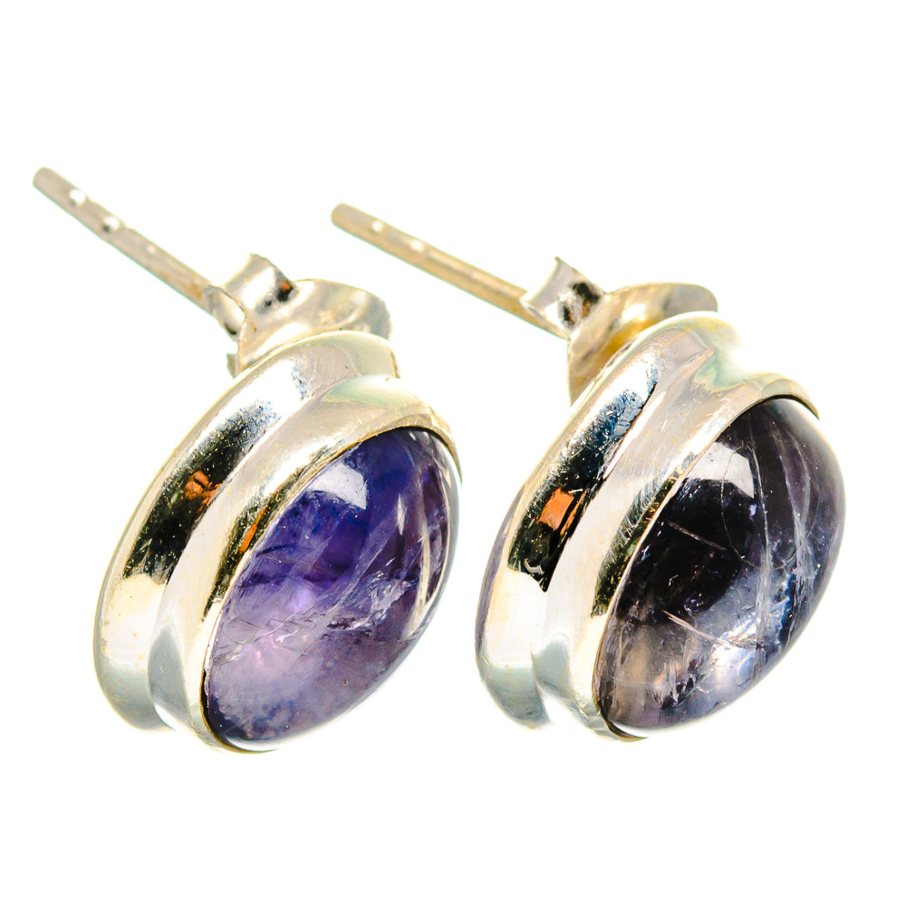 Oval tanzanite stud earrings in 925 sterling silver bezel with purple stone and post backs