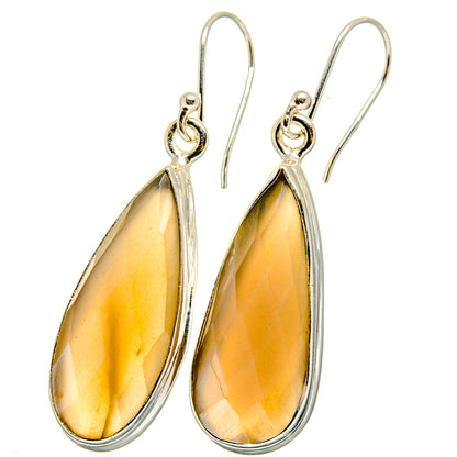 Sterling silver moonstone teardrop earrings with golden teardrop stone and hook backs