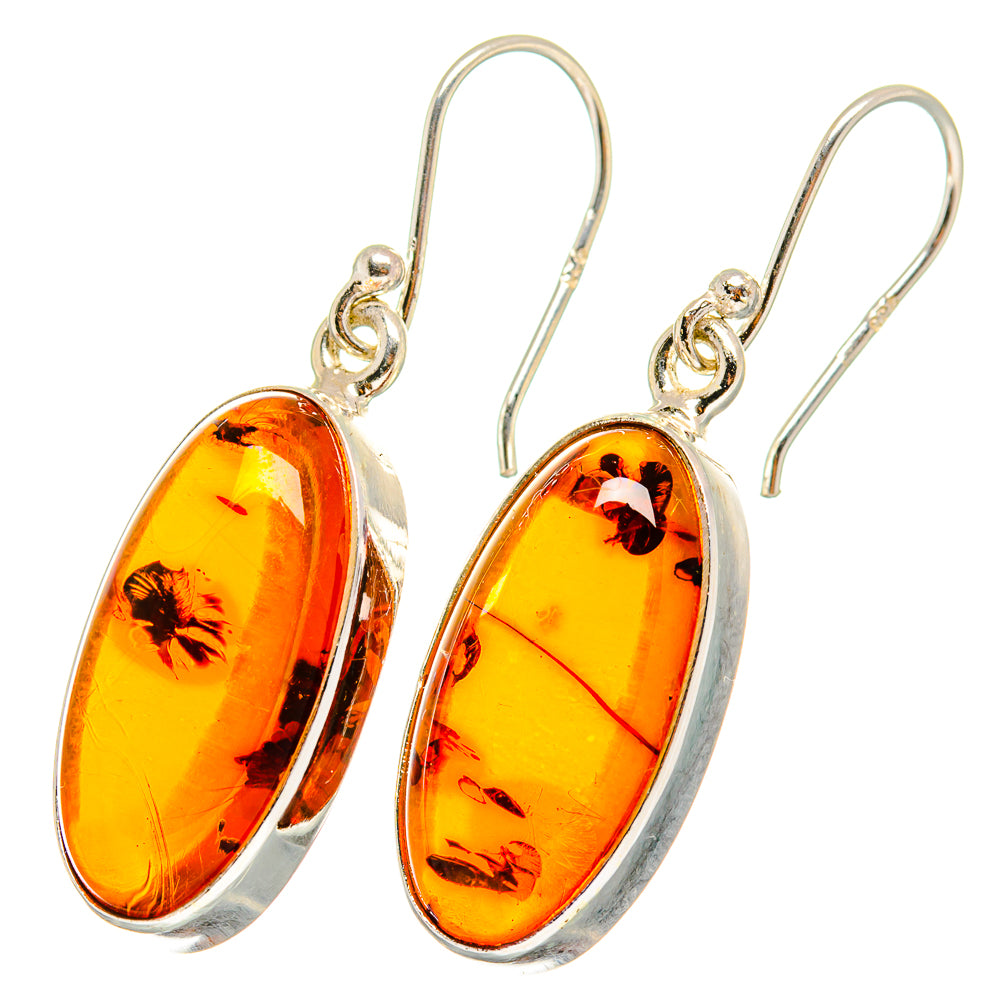 Amber oval drop earrings with sterling-silver bezel and gold-tone top hooks