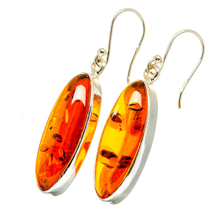 Amber teardrop earrings with 925 sterling silver hooks and oval loops