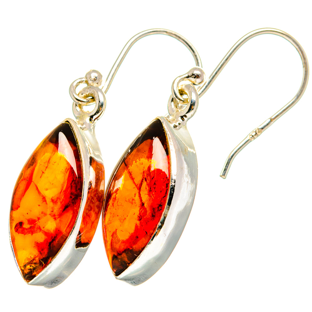 Amber teardrop earrings in silver, with drop-shaped orange-red stones