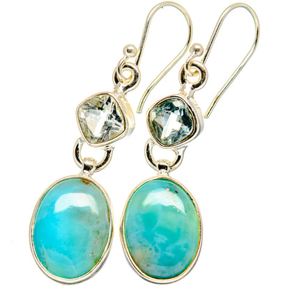 Silver-tone drop earrings with clear oval top stones and large turquoise oval charms