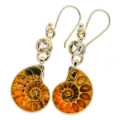 Ammonite fossil dangle earrings with white quartz accents and sterling silver hooks