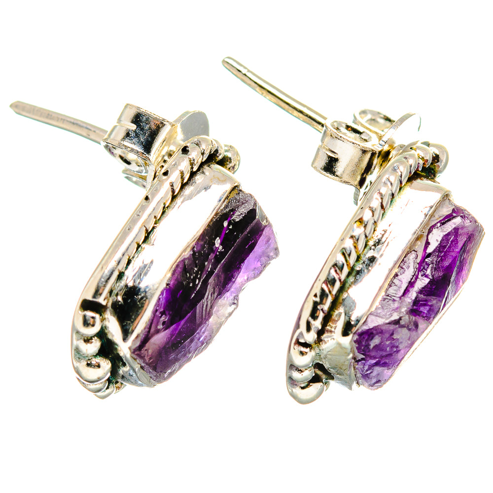 Sterling silver amethyst stud earrings with rough purple stones and hinged posts