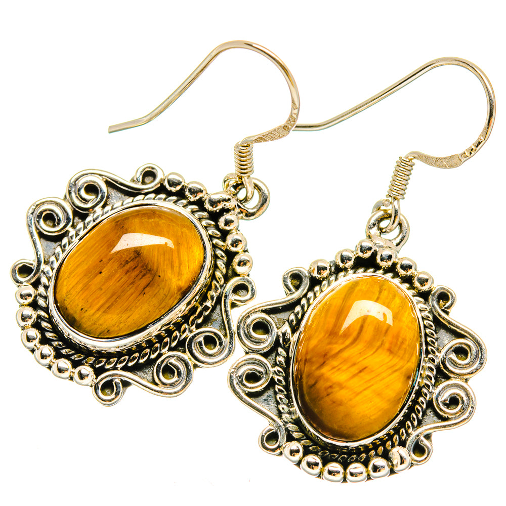 Sterling silver tiger eye oval earrings with decorative filigree and fishhook backs