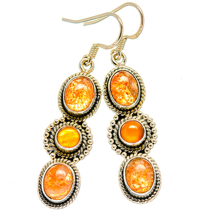 Sterling silver dangle earrings with three oval orange sunstone cabochons each