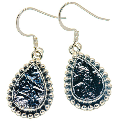 Sterling silver hook earrings with rough black teardrop galena and beaded halo