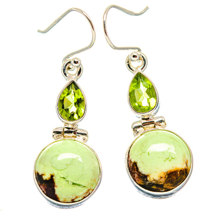Dangling sterling silver earrings with green teardrop top and round bottom gemstones