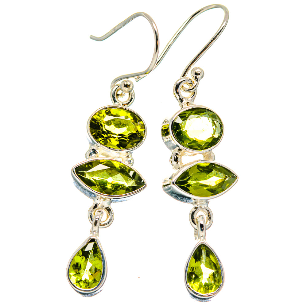 Sterling silver peridot drop earrings, three oval stones and one teardrop